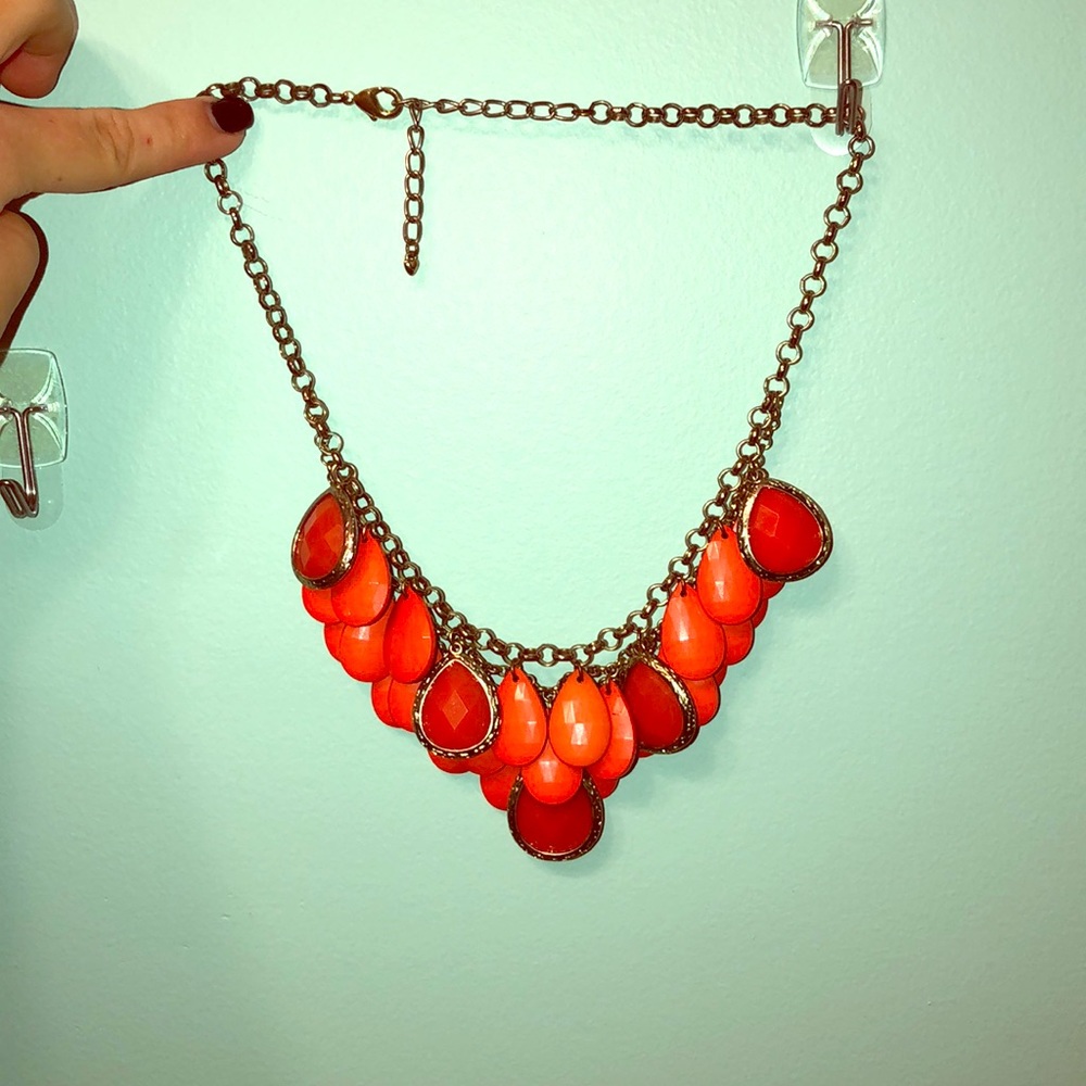 Orange beaded and stacked necklace